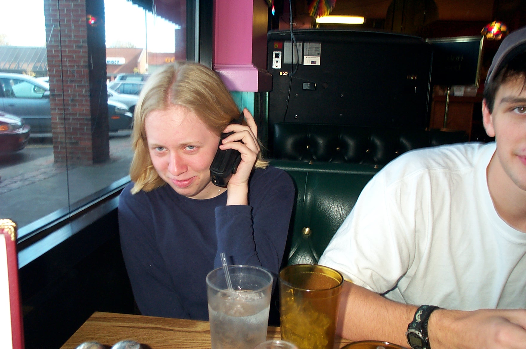 Gayle talking on phone in El Amigo