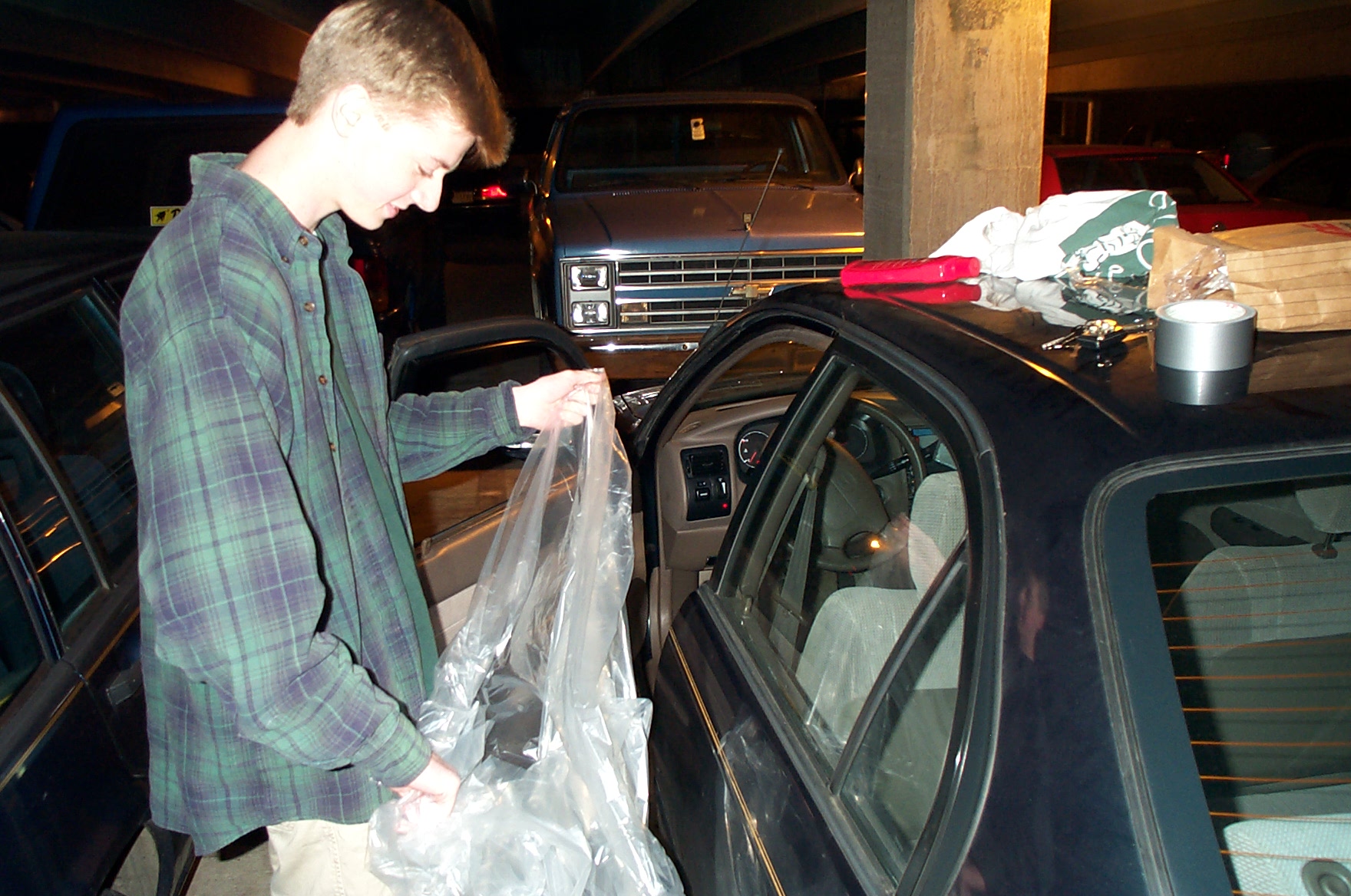 Alex taping the window up