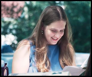 Ashley reads a graduation card