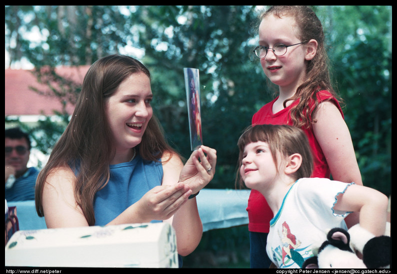 ashley reads card to kids 1