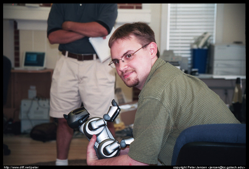 thomas plays with aibo