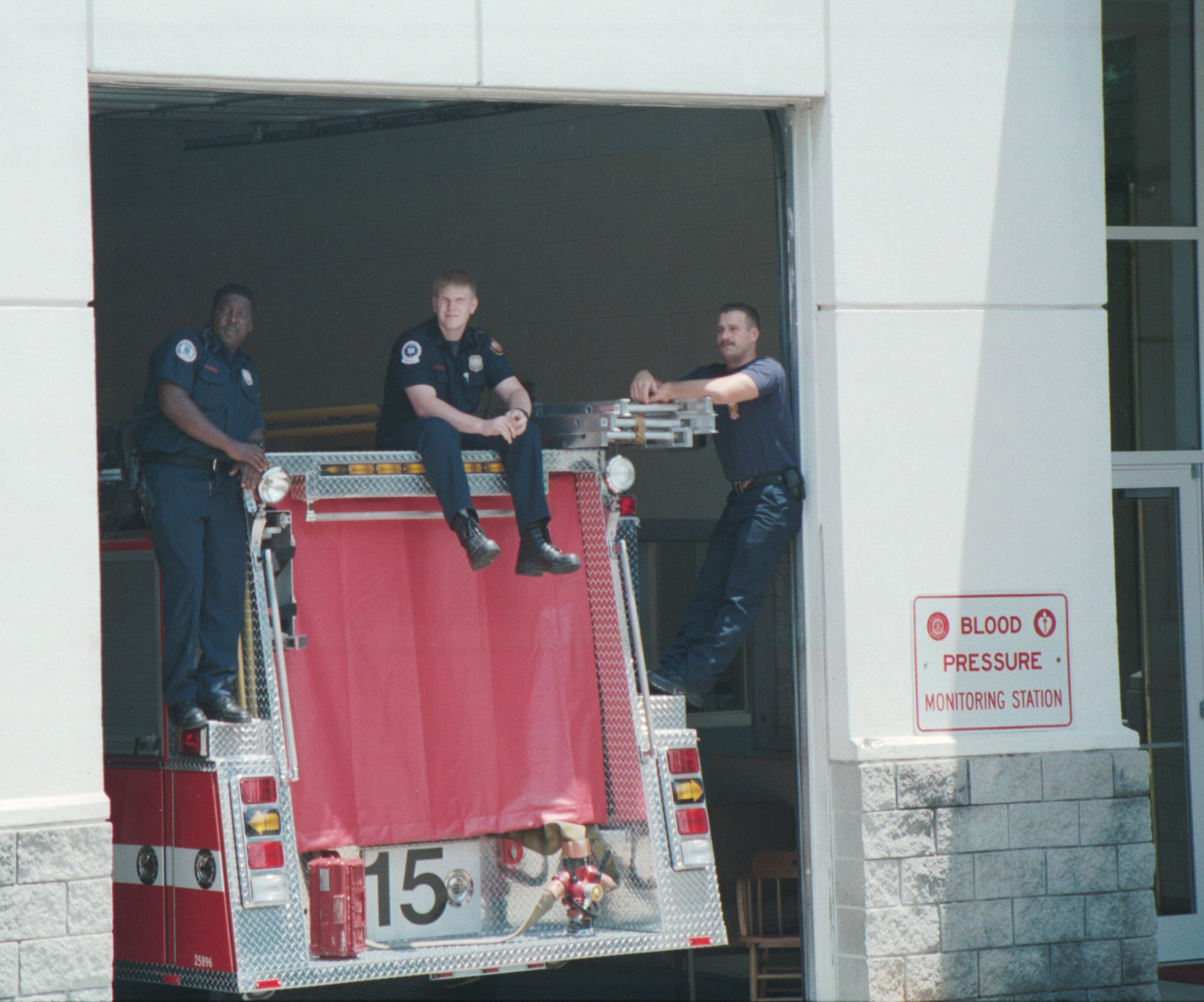 firemen watching parade