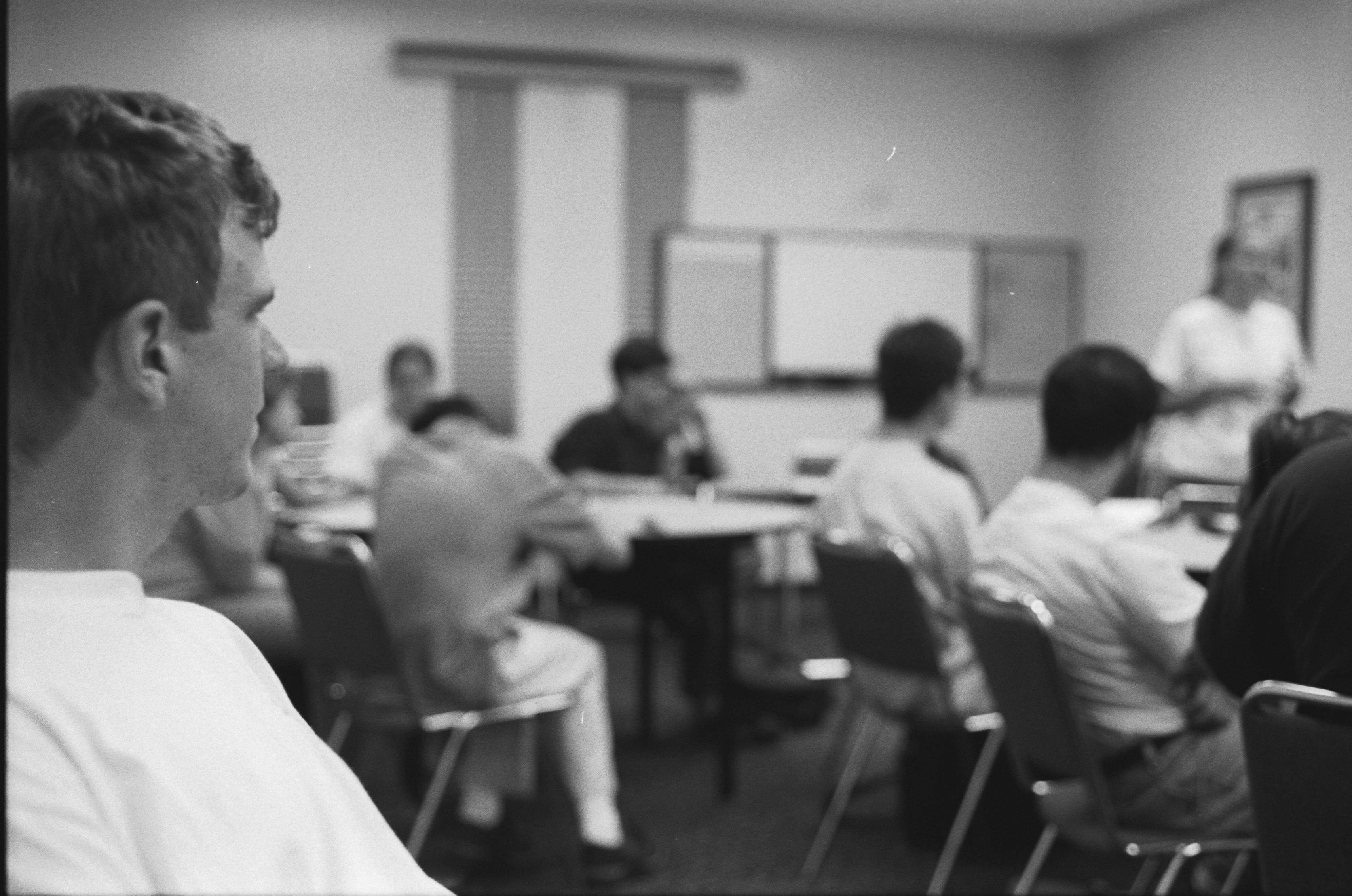 Peter watches at photo club meeting