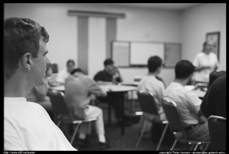 Peter watches at photo club meeting