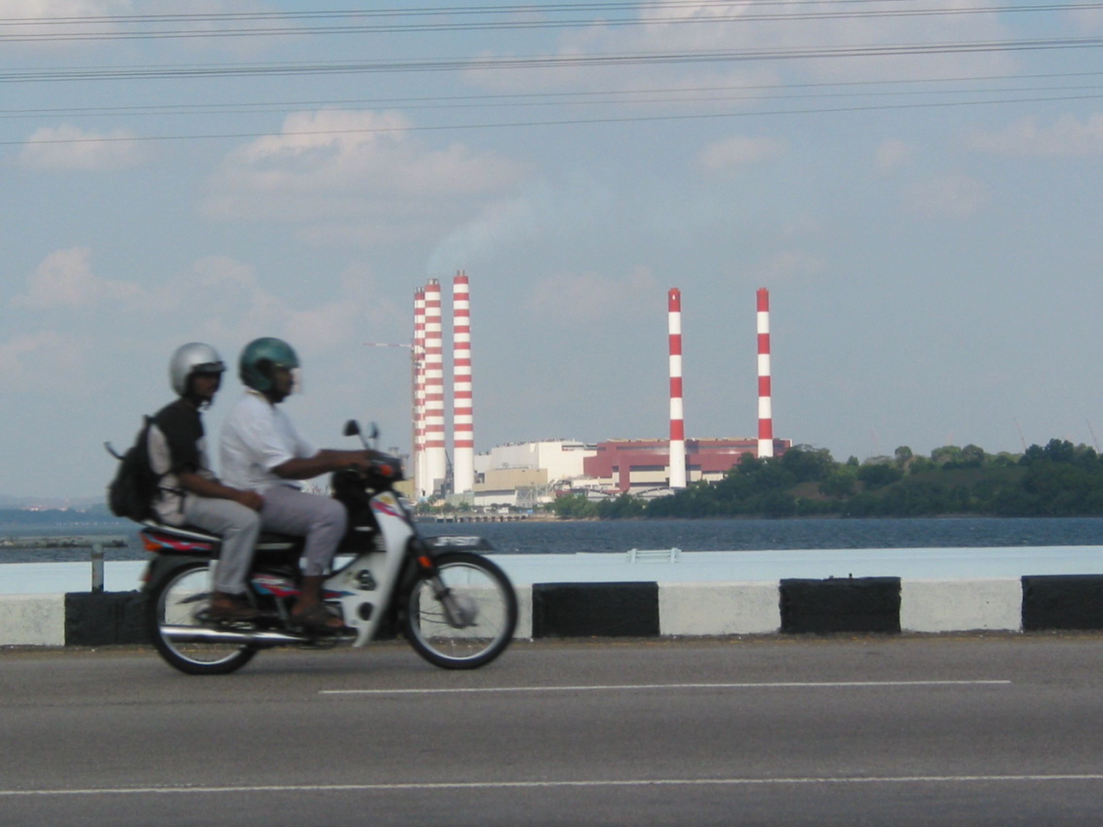 crossing into Malaysia on a bike