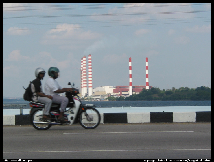 crossing into Malaysia on a bike