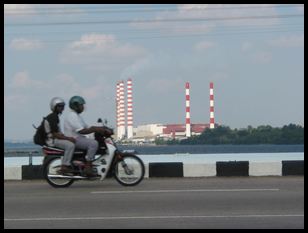 crossing into Malaysia on a bike