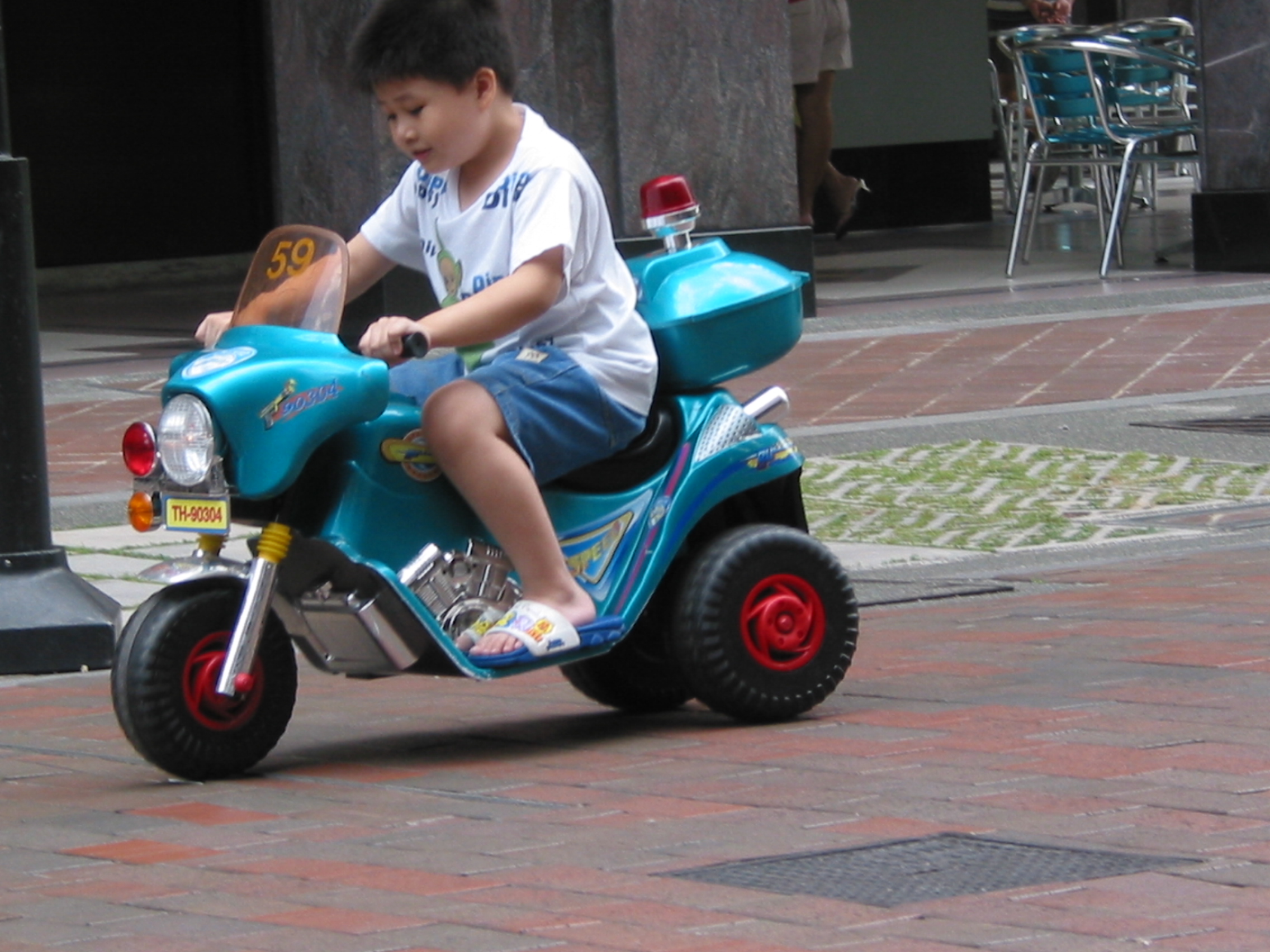 kid on scooter