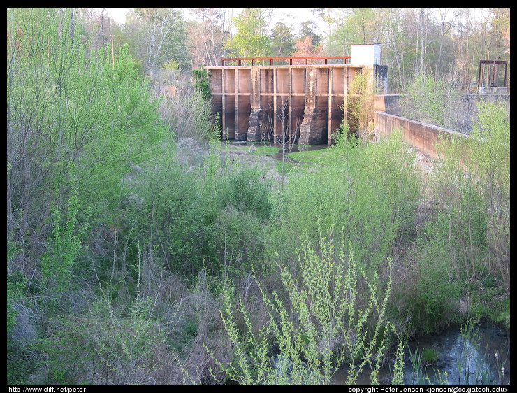 spillway with sluice gates for the mill