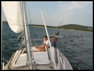 note the windsurfer blasting by off the aft end of our boat