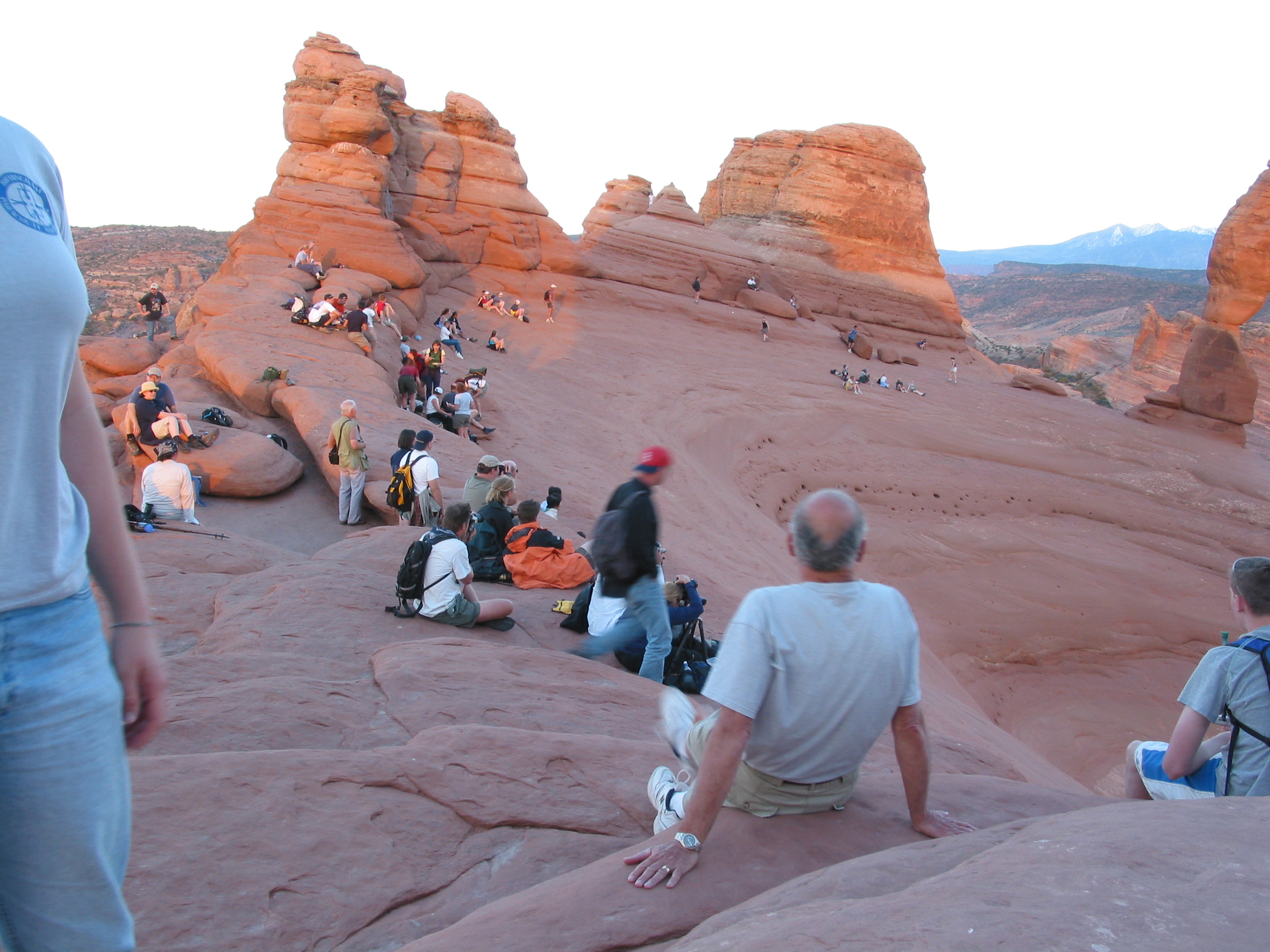 photographers and viewers preparing for sunset