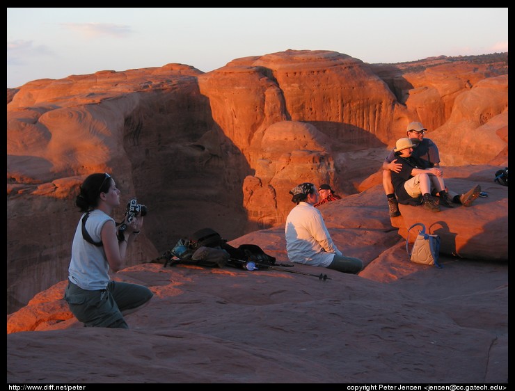 photographers and viewers of the arch