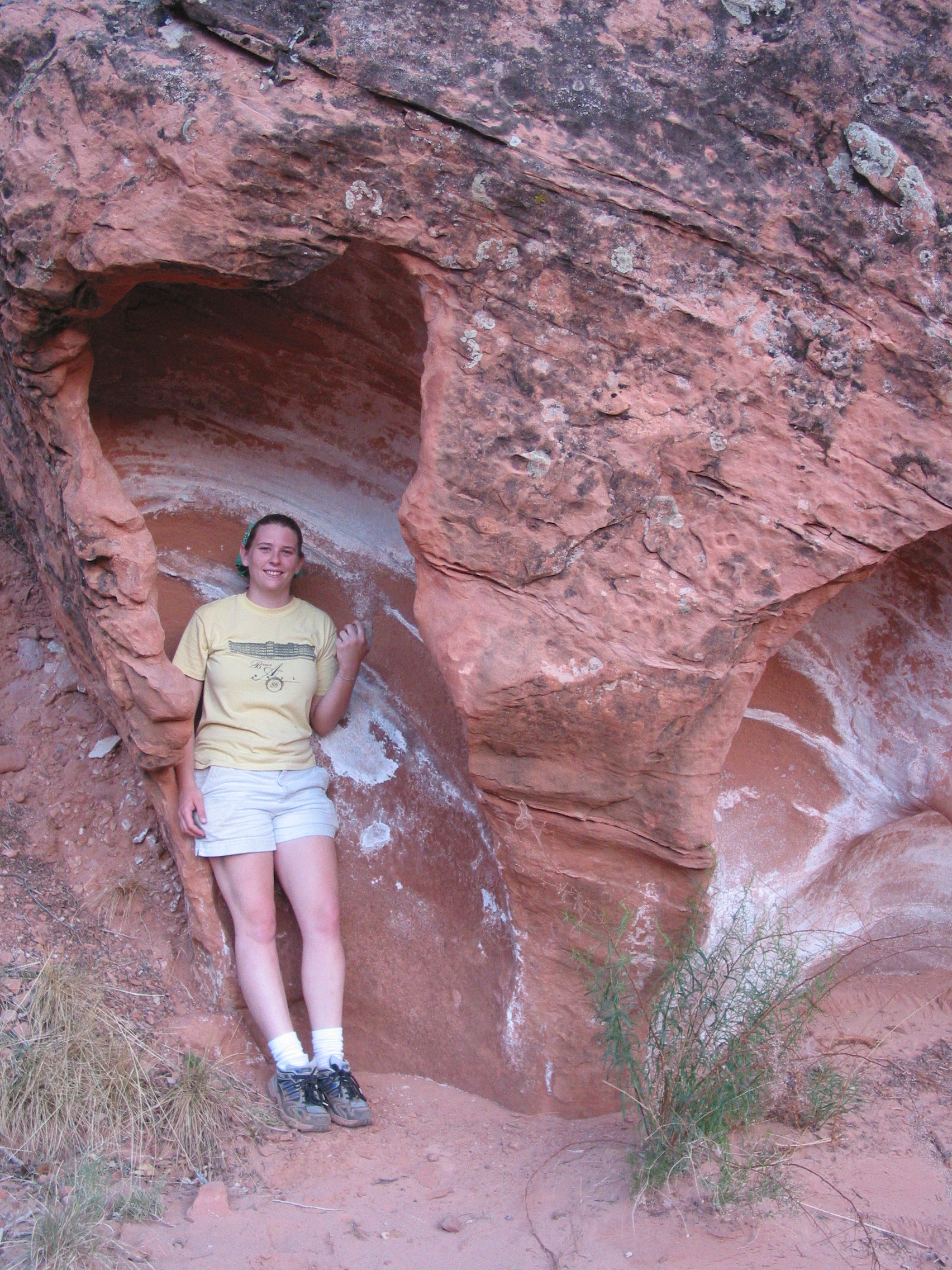 Ana in a neat sandstone formation in a wash we hiked down