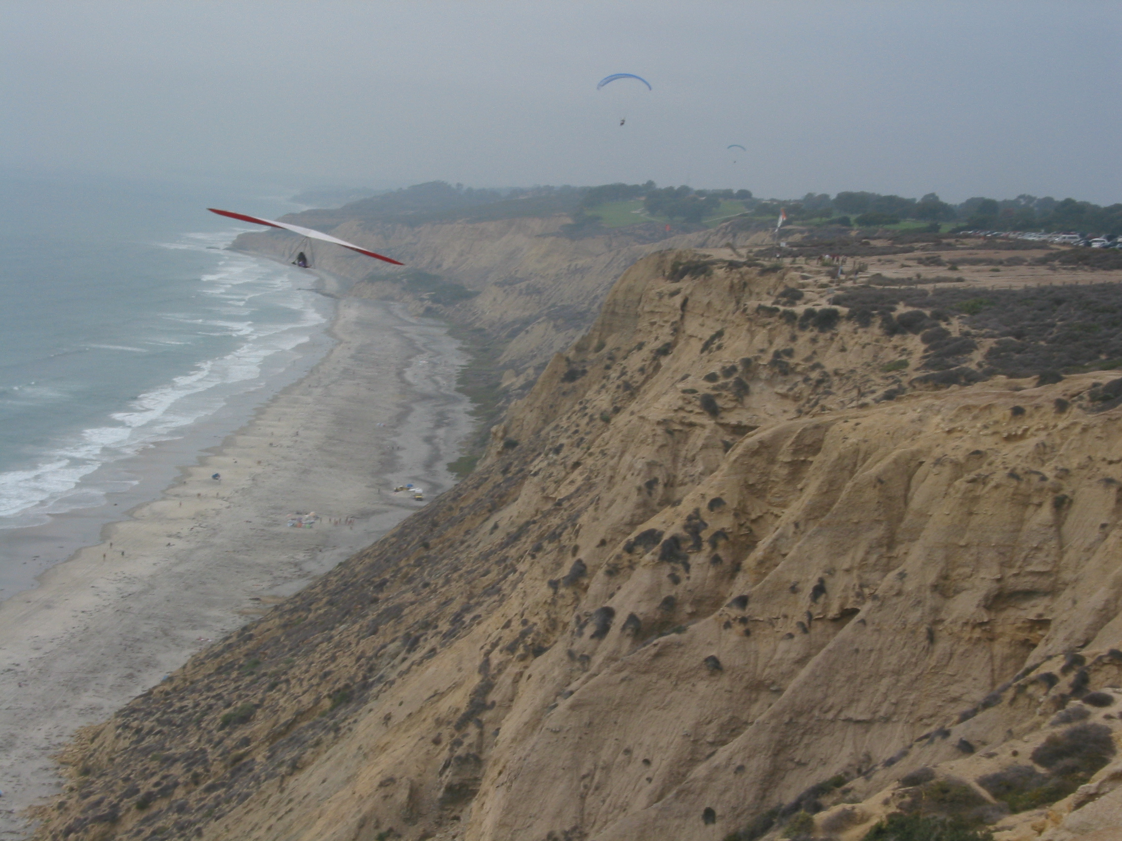 a hang glider coming toward us