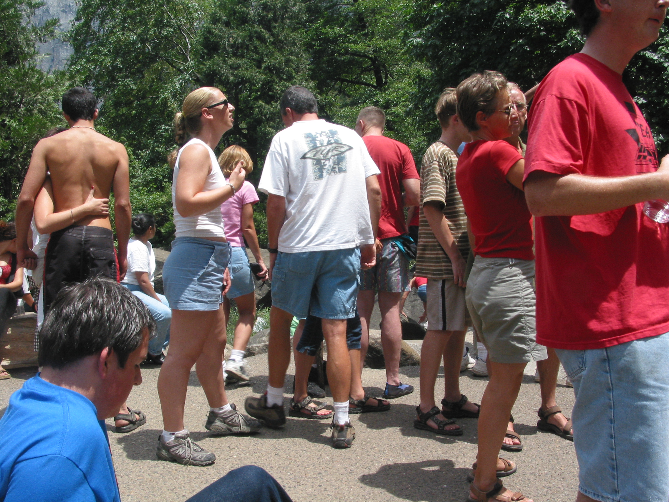 random human masses around the base of the falls