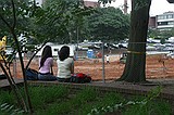 girls sitting in front of the construction