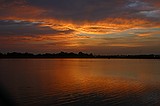 the sunset, as viewed from the Howell Mill Atlanta waterworks. High perspective images were shot over the fence with me standing on top of my bike rack; others were shot through the fence (hence the vingetting).