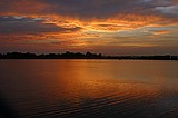 the sunset, as viewed from the Howell Mill Atlanta waterworks. High perspective images were shot over the fence with me standing on top of my bike rack; others were shot through the fence (hence the vingetting).