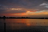 the sunset, as viewed from the Howell Mill Atlanta waterworks. High perspective images were shot over the fence with me standing on top of my bike rack; others were shot through the fence (hence the vingetting).