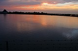 the sunset, as viewed from the Howell Mill Atlanta waterworks. High perspective images were shot over the fence with me standing on top of my bike rack; others were shot through the fence (hence the vingetting).