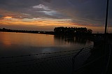 the sunset, as viewed from the Howell Mill Atlanta waterworks. High perspective images were shot over the fence with me standing on top of my bike rack; others were shot through the fence (hence the vingetting).