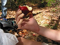 oops on the fingers and an apple