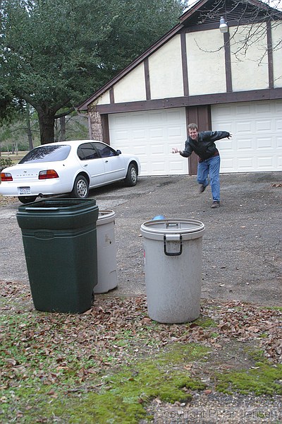 Peter demonstrating lawn bowling at 911 Jeff Davis