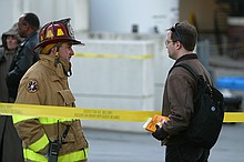 the guy on the right is holding "2000 Emergency Response Guidebook"