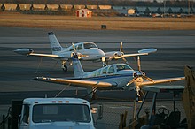 shot through a wire-filled glass window, but focus was far enough away that it's not too visible. Cessna 310Q and a Beech