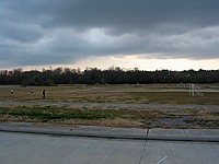 River Green with neat ominous clouds