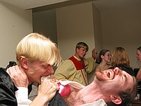 family poetry. Dave's brother (the choir boy) calmy waits in the background, while Dave ravages the fake boobs