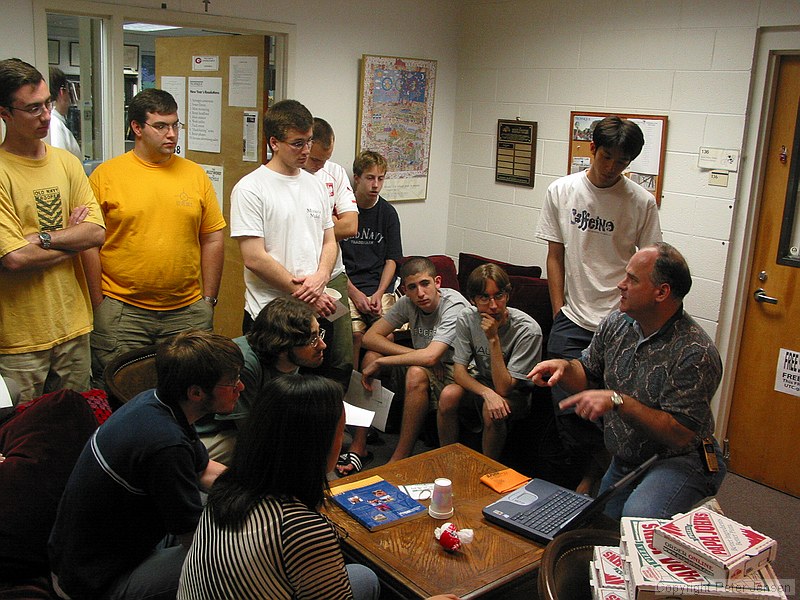 Stanley Leary giving the student publications photography staff a talk about his approach to photojournalism