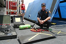 a fireman kindly demonstrated one of their heavy lifting bags to me -- an airbag similar to this one can be shoved under a fallen piece of comcrete (or structure) and can lift huge amounts.  This particular bag is rated for a maximum of 34.7 tons, which i