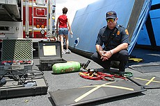 a fireman kindly demonstrated one of their heavy lifting bags to me -- an airbag similar to this one can be shoved under a fallen piece of comcrete (or structure) and can lift huge amounts.  This particular bag is rated for a maximum of 34.7 tons, which i