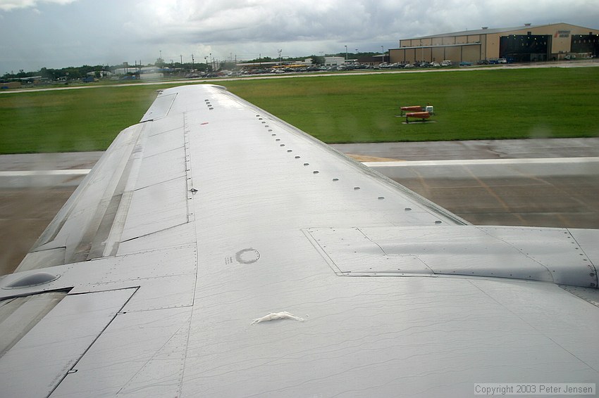 A sequence of images showing a piece of paper towel left on the wing by a maintenance guy as it blows off the wing on the takeoff roll.  It was almost completely gone before Vr.