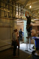 workers building part of the new post office