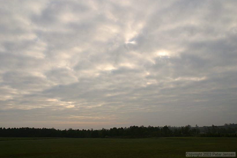 early morning clouds with a few blue spots showing through