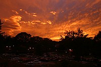 this was an absolutely beautiful sunset that only lasted for a few minutes.  I thought the sun was already gone when this came up about ten minutes later; the high altitude cloud layer really did well.   No saturation enhancement has been done.