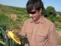 Spencer holding the unearthed nose cone