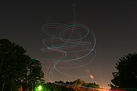 skywriting with the Funplanes Edge 540 foamie and some LEDs.  Charles Frey took the pictures.