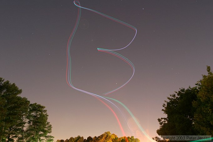 skywriting with the Funplanes Edge 540 foamie and some LEDs.  Charles Frey took the pictures.