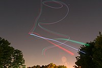 skywriting with the Funplanes Edge 540 foamie and some LEDs.  Charles Frey took the pictures.