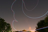 skywriting with the Funplanes Edge 540 foamie and some LEDs.  Charles Frey took the pictures.