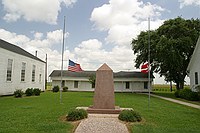 flags at half staff for President Reagan