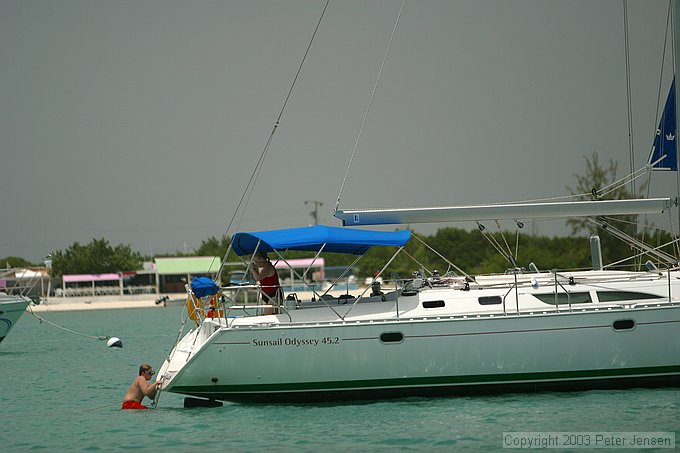 Calvin boarding Aries after a swim