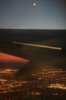 moon and wing over Toronto on departure