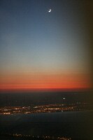 moon and wing over Toronto during departure