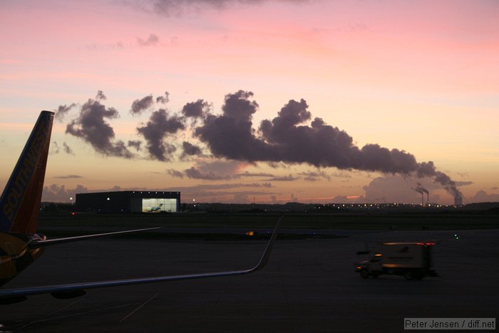 condensation from the cooling towers at OUC's Curtis Stanton power plant, a few miles to the NE