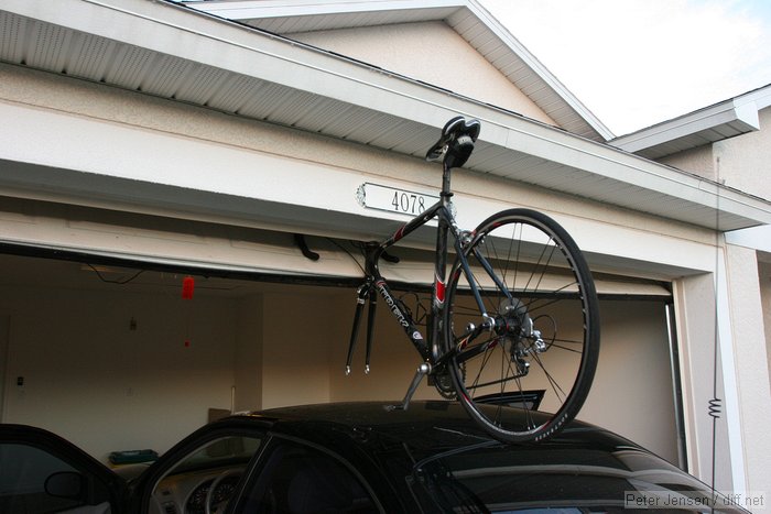 The door was going up when the bike hit; nothing was visibly damaged, but I replaced the fork because it had been stressed pretty hard.  The bike rack pulled off of the car and took most of the load.