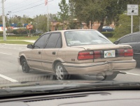 bad shape -- note the totally flat spare tire on the left front